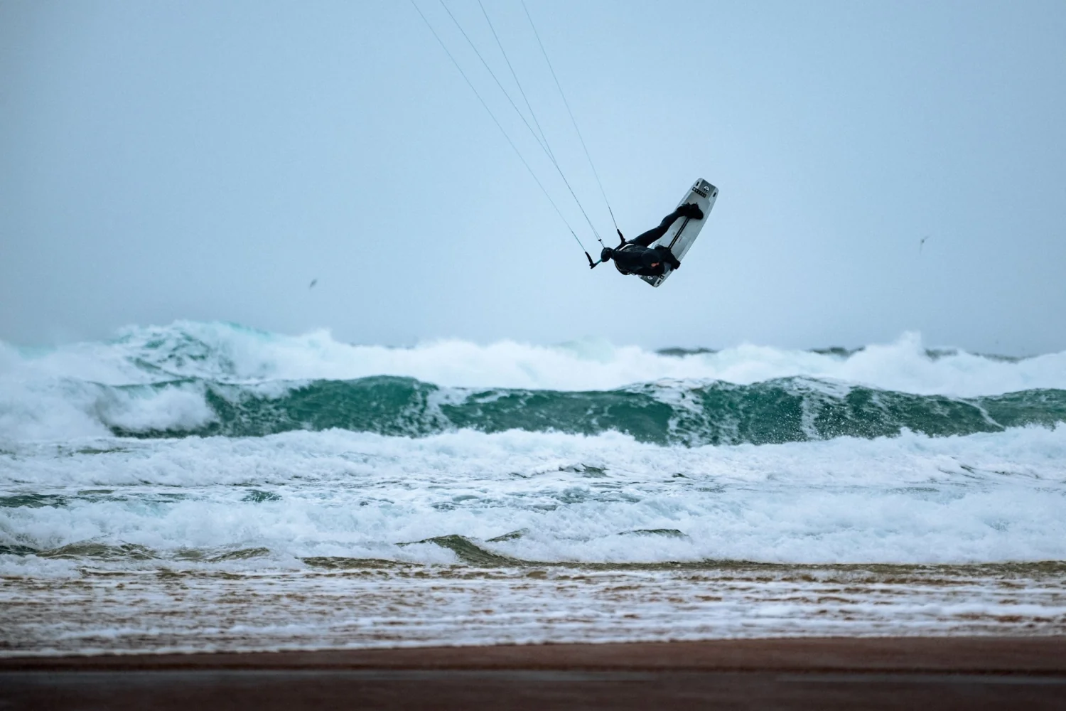 Voltt Hooded Fullsuit 6/4/3mm Fzip — Mystic Voltt Hooded Wetsuit Marketing Image 1